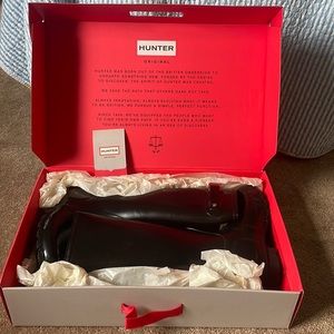 Hunter black knee high boots